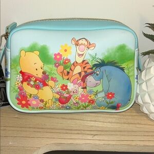 Disney Loungefly Light Blue Winnie the Pooh, Tigger & Eeyore Floral Cosm Pouch